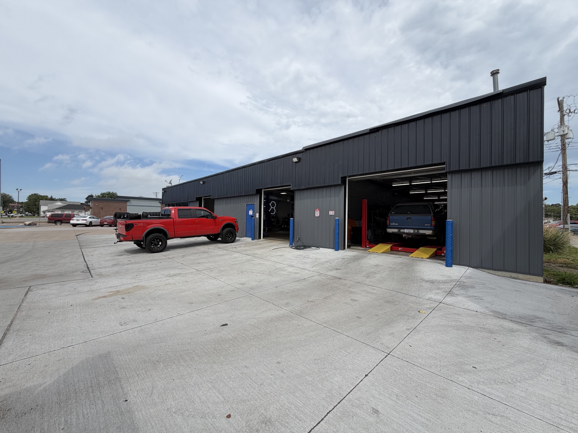 Full row of open service-bay doors